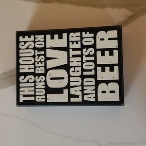 Love laughter and beer wooden sign